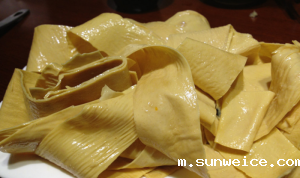 手工豆皮制作逐渐迈向机械化